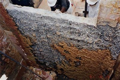 Note the few remaining tiles in the corner of the pit some, which have fallen to the floor.